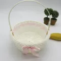 White imitation rattan woven flower basket with pink bow, ideal for wedding storage and gifts. - Diameter 13 x Height 17cm / Pink Polka Dot Ribbon