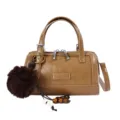 Brown PU leather Boston handbag with top handle, crossbody strap, and cute pom-pom charm. - With Pendant / Yellow Brown