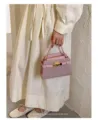 Detailed view of women casual solid color top handle small square bag retro shoulder bag - Pink