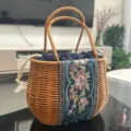 Wicker woven handbag with embroidered fabric panel, elegant oval basket for daily use. - Shell Embroidery Handheld Basket / 19x13x16cm