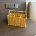 Woven storage basket detail view featuring multiple compartments and a sturdy carry handle. - Compartments / 30x17.5x15.5cm / Light Rattan Mix