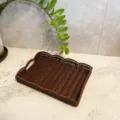 Detailed close-up of a brown woven rattan serving tray with wave edge for kitchen and home decor. - Rectangular Lace Tray / 38x28x5cm