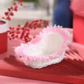 Detailed view of the pink lace woven heart-shaped basket, ideal for wedding flower girl use. - Pink Lace without Handle