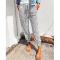 Casual leopard print joggers for women, featuring a comfortable elastic drawstring waist. - S / White