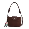 Brown retro suede shoulder bag with knotted handle and cute colorful pendant for women. - Brown