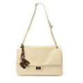 Beige woven shoulder bag variant, stylish flap design with elegant turn-lock and charm. - With Pendant / Off White