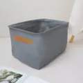 Grey fabric storage basket with brown handle for wardrobe and home organization. - M / Gray