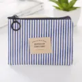 Blue white striped canvas coin purse with zipper closure and stylish quote patch for daily use. - Blue Stripe
