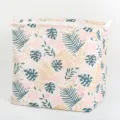 Cesta de ropa plegable de tela con estampado de hojas tropicales y asas para el hogar. - Estilo de algodón y lino con hojas de banano