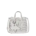 Chic borsa a secchiello bianca con motivi traforati e ciondolo a stella elegante. - Bianco avorio