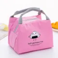 Pink insulated lunch bag with cute cartoon print and durable oxford fabric handles for daily use. - Small Rice Ball
