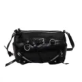 Black shiny leather cylindrical shoulder bag with edgy metal zippers, buckles, and studs. - Black