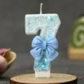 Blue glitter number 7 birthday candle with cute bow for cake decoration party supplies. - Blue Bow Candle 7
