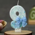 Blue glitter number 9 birthday candle with cute bow for kids party cake decoration. - Blue Bow Candle 9