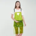 Grembiule trasparente da donna in TPU con spalline a catena e tasca con zip, abbigliamento. - Modello con cerniera verde in TPU