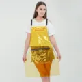 Grembiule da donna trasparente in TPU alla moda con tasca con zip e spallacci a catena. - Modello con cerniera in TPU arancione