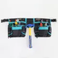 Cinturón portaherramientas multifunción con múltiples bolsillos y resistente tela oxford. - Combinación negro y azul (sin hebilla magnética) YB012