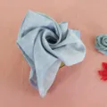 Pure linen napkin in light blue, elegant rose fold for dining table decoration and hotel use. - Yarn-Dyed Blue CJ001