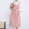 Japanese style pink cotton linen apron with front pockets, ideal for baking and floral design. - Pink