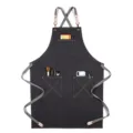 Dark grey canvas cross-back apron with multi-pockets and leather straps for kitchen baking. - Webbing Thick Canvas Style E / Dark Gray