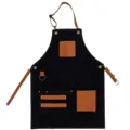 Black canvas apron with brown PU leather straps and pockets, ideal for daily work. - Black Patchwork with Brown Leather