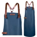 Blaues PU-Leder-Schürze mit braunen Kreuzgurten und Metallschnallen, ideal für Küche und Kochen. - Y-Lederriemen - Marineblau