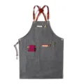Grey canvas work apron with brown leather straps and multi pockets for kitchen and cafe use. - Round Badge Belt Canvas Grey Style R