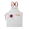 Canvas work apron with leather straps and multiple utility pockets, gray barber and kitchen style. - Round Badge Belt Canvas Apricot Style R