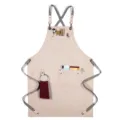 Beige canvas apron with cross back straps, multi-pockets for kitchen, barista, and salon work. - Style D / Khaki