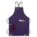 Adjustable cross back purple canvas apron with multiple utility pockets and towel ring for kitchen. - Style D / Purple