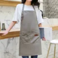 Tablier de cuisine en toile grise avec poches et sangle de cou réglable pour barista. - Collier / Gris foncé