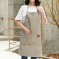 Tablier de travail en toile kaki avec sangle de cou reglable et poches pour cafe restaurant - Collier / Abricot