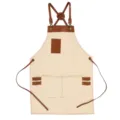 Canvas kitchen apron with brown leather cross straps and multi-pockets, beige variant - Off-White with Brown Leather