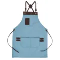 Blue denim apron with brown leather straps, cross-back design, ideal for cooking and gardening. - Light Blue with Coffee Brown Leather