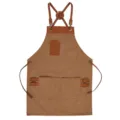 Crossback canvas apron with leather pockets and adjustable straps for kitchen, cafe, or baking. - Camel with Brown Leather