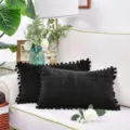 Elegant coussin en chenille noir avec des pompons pour canape de salon et decoration. - Noir