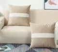 Detailed shot of modern thickened velvet patchwork throw pillow in khaki and white stripe design. - Khaki