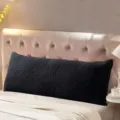 Coussin de corps en peluche noire pour tête de lit, long traversin de soutien confortable. - Noir