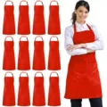 Red kitchen apron with front pocket, adjustable neck strap, ideal for cooking, baking and gardening work. - Polyester (Pack of 12) / Red
