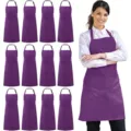 Bulk 12-pack purple kitchen aprons with pockets and adjustable neck straps for work. - Polyester (Pack of 12) / Purple