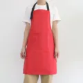 Tablier de cuisine impermeable rouge avec tour de cou et deux poches style de travail. - Rouge