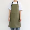 Tablier de cuisine étanche vert avec deux poches avant et lanière de cou réglable. - Vert Militaire