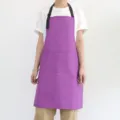 Tablier de cuisine imperméable violet avec deux poches et bretelles réglables pour travail. - Violet