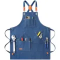Durable denim work apron with multiple tool pockets, cross-back straps for comfort. - Blue