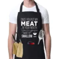 Black canvas kitchen cooking apron with funny BBQ text print and practical front utility pockets - Swallow