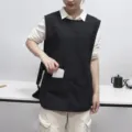 Black tabard apron vest for kitchen cooking cafe workwear with pockets utility style. - Black