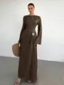 Detail view of the elegant brown pleated long sleeve maxi dress with stylish metal waist buckle. - S / Coffee