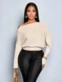 Close-up detail showing off-shoulder sequin knit fabric, batwing sleeves and waist-cinched design. - S / Apricot