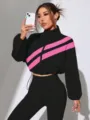 Close-up detail of women fashion colorblock diagonal stripe stand collar short jackets. - S / Black and Rose Pink