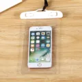 Clear waterproof phone pouch for beach swimming, universal dry bag with secure seal clip. - White